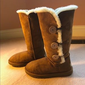 Brown buttoned UGG boots
